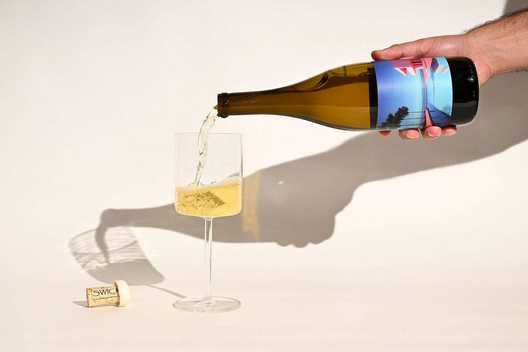 Hand pouring Swick Wines 2022 Poolz 