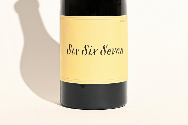 Close-up of Swick Wines 2023 Six Six Seven bottle label showing handwritten-style typography