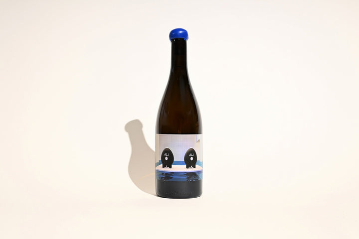 Swick Wines 2023 Two Eggs Aligote bottle with blue wax cap and illustrated egg characters label on beige background